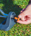 oscillating sprinkler nozzle cleaner end plug
