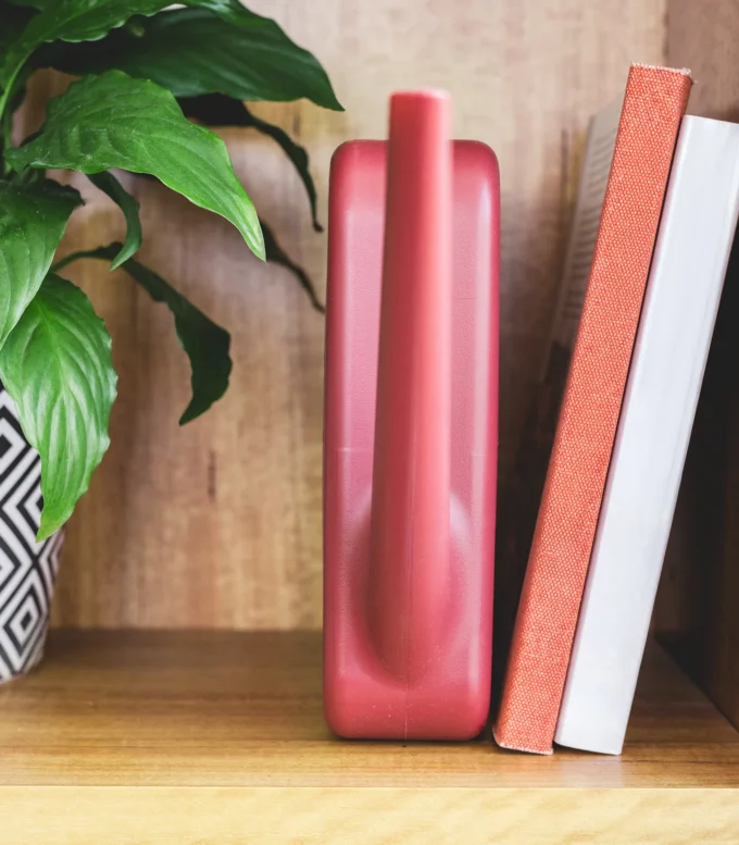 2L Slimline Watering Can on bookshelf